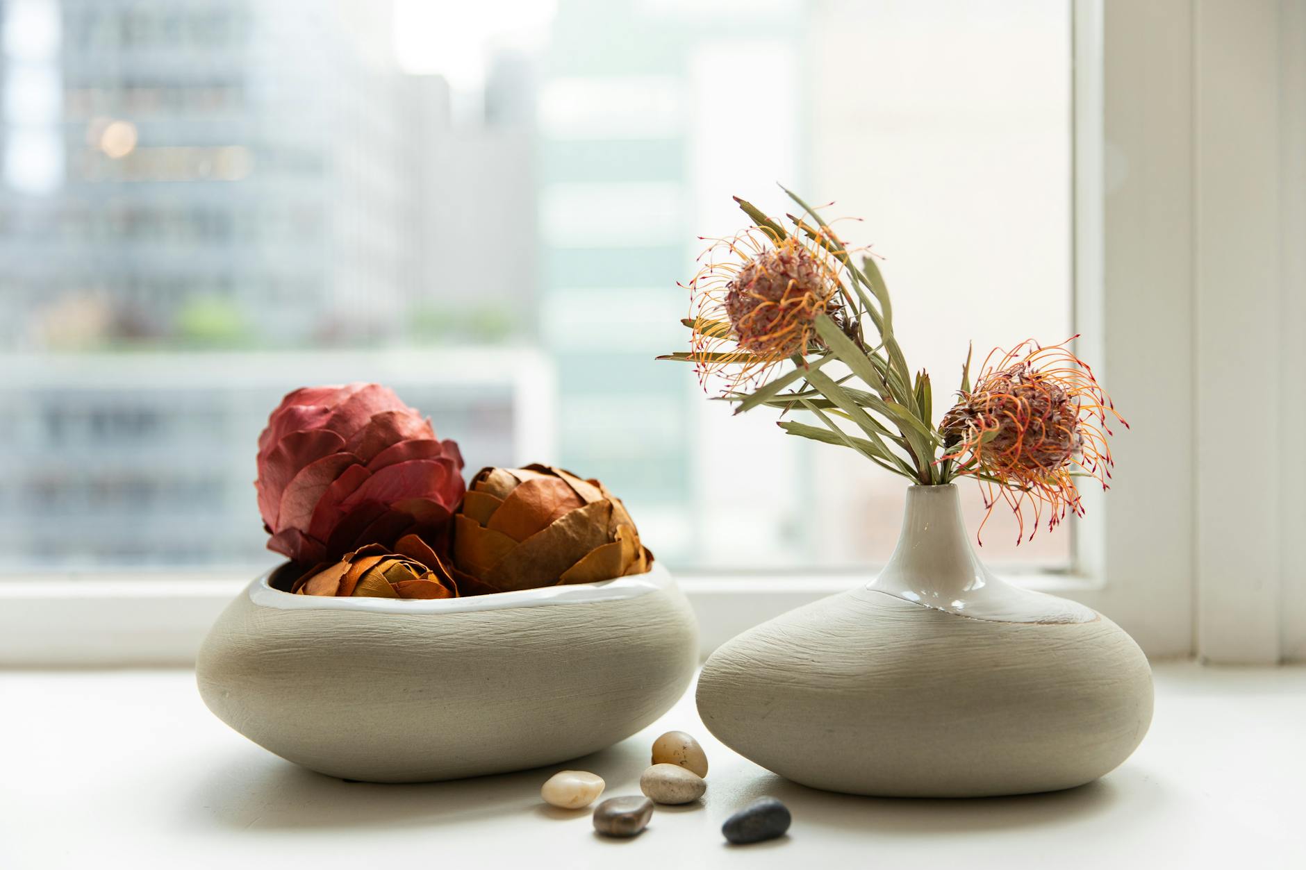 vases on a window sill